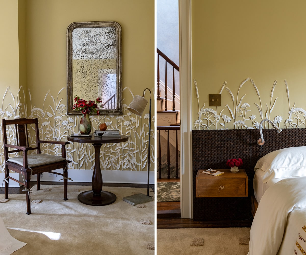 bedroom with floral plaster detail on walls