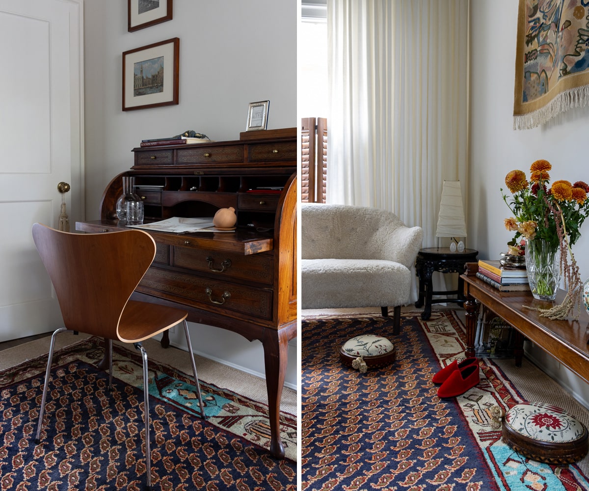 a desk and a sofa in a study