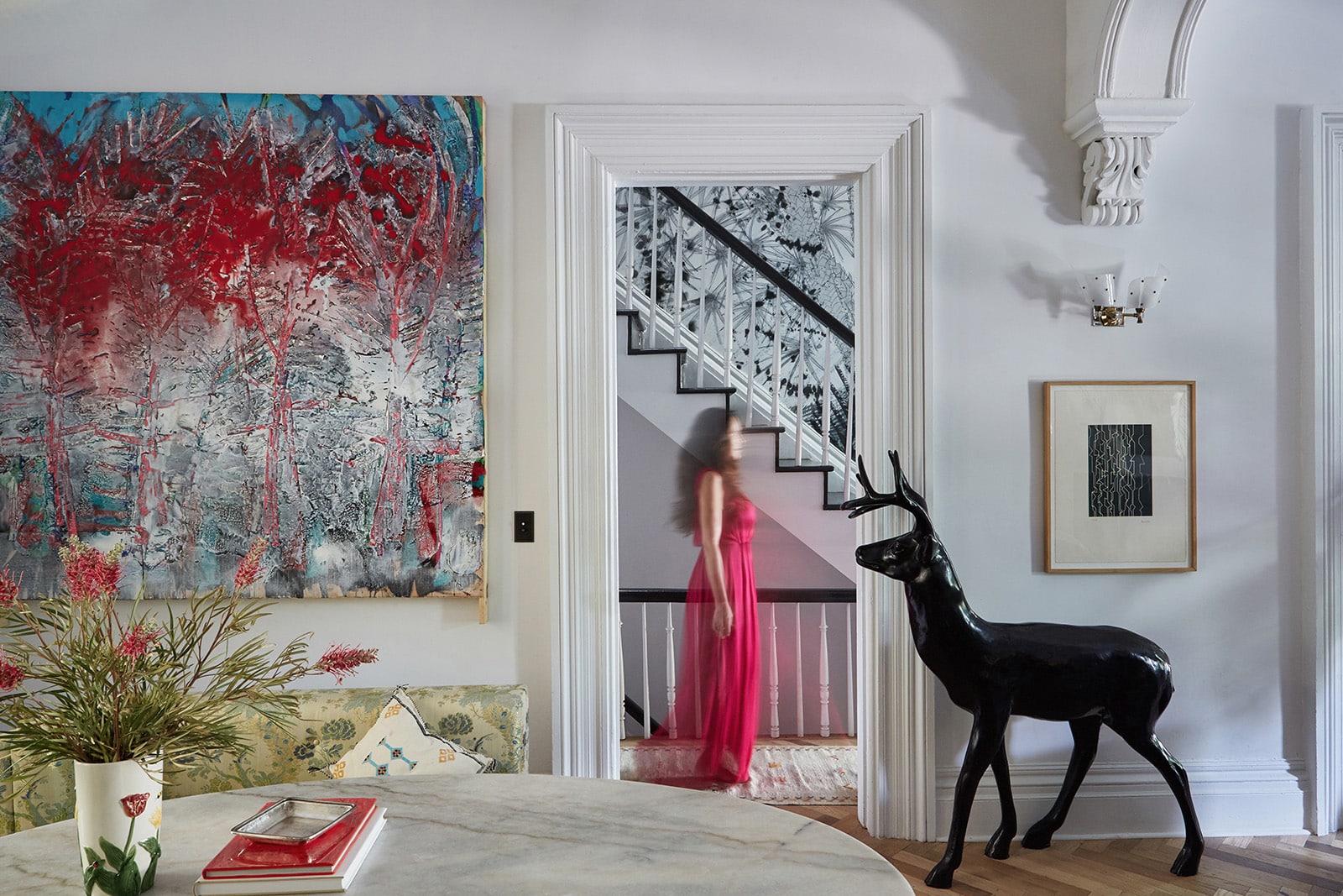 A deer statue found at a garden center signals Galli’s obsession with nature as a decorating theme. The abstract painting on the wall is by New York-based French artist Guillaume Paturel