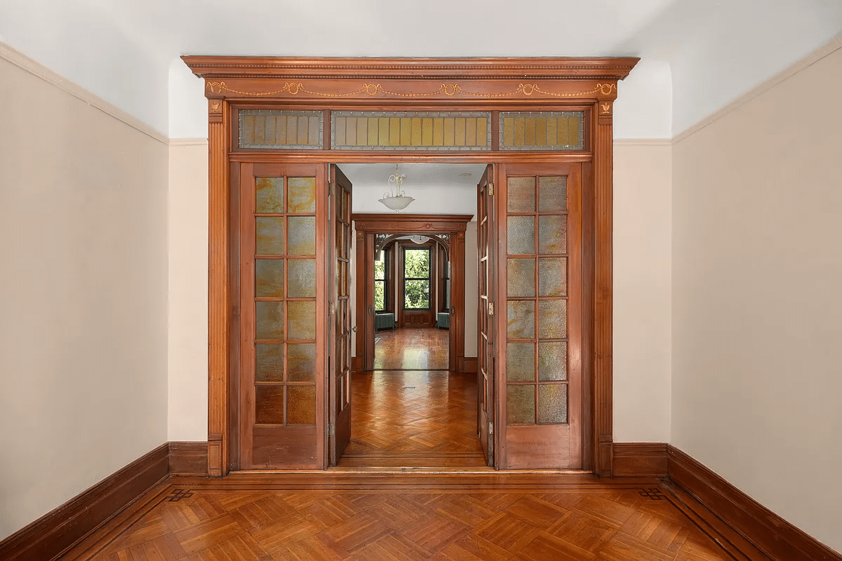 doorway between parlors fitted with french doors