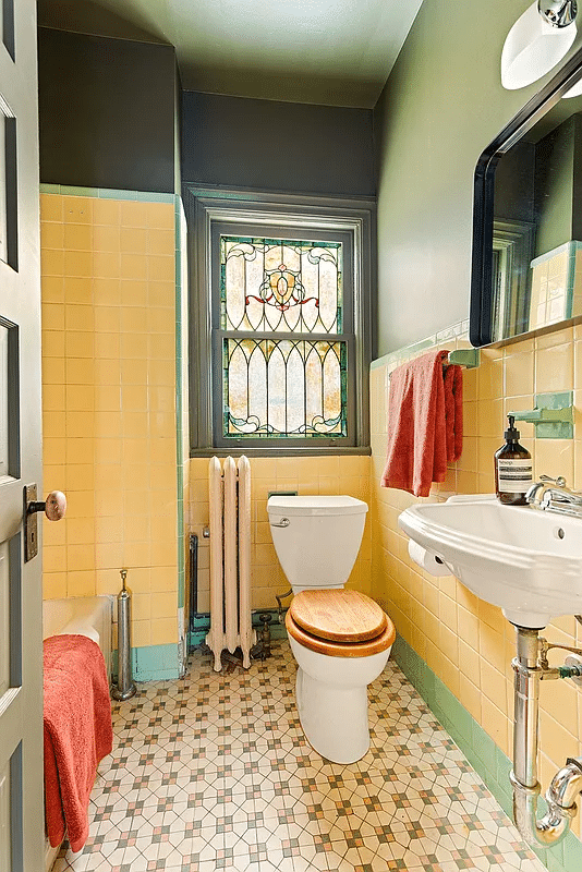 bathroom with yellow and green art deco tile