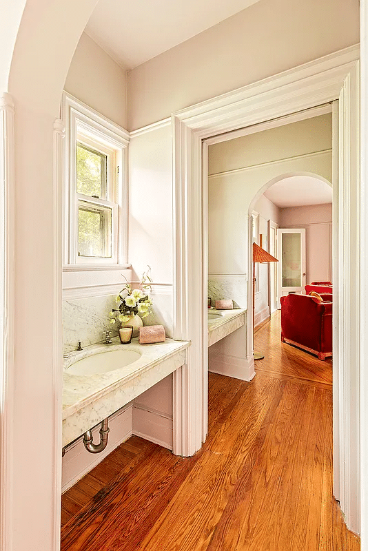 passthrough with two marble sinks