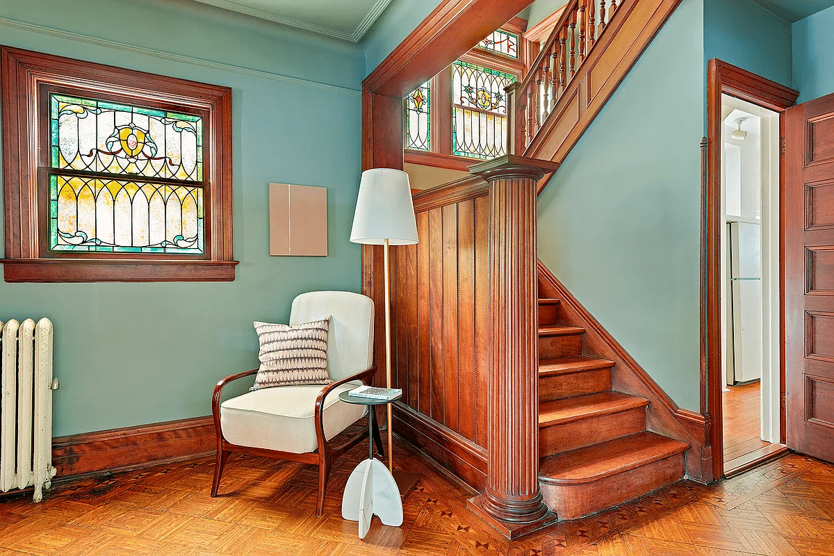 entry hall with stained glass, staircase