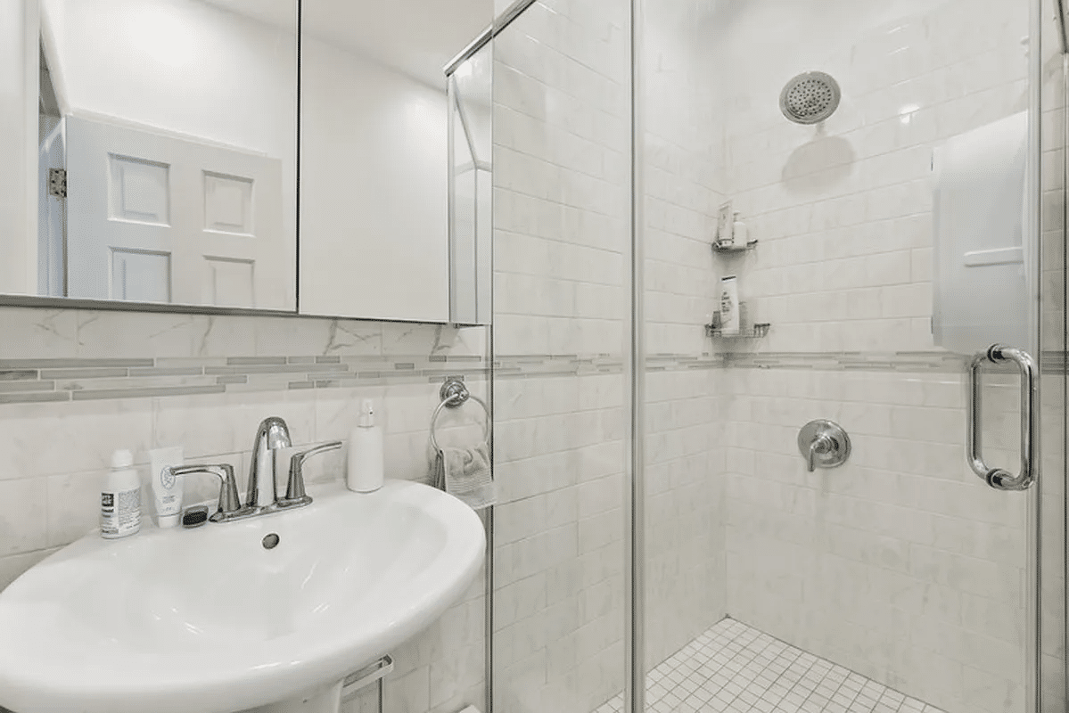 bathroom with glass doored shower