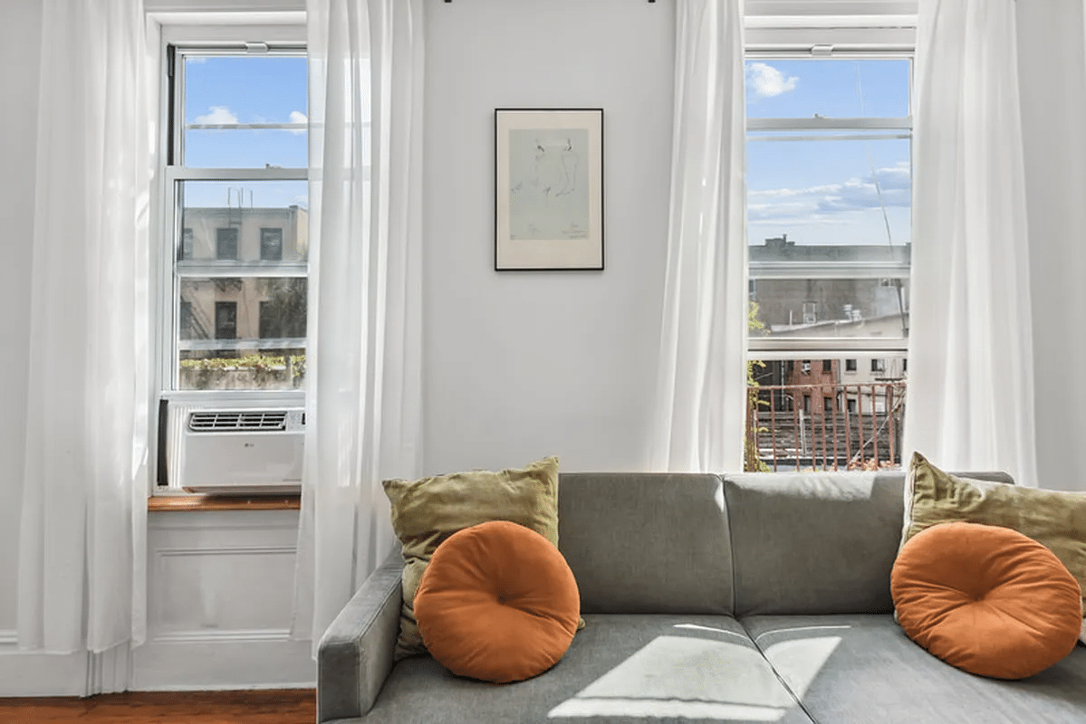 living room with view of two windows