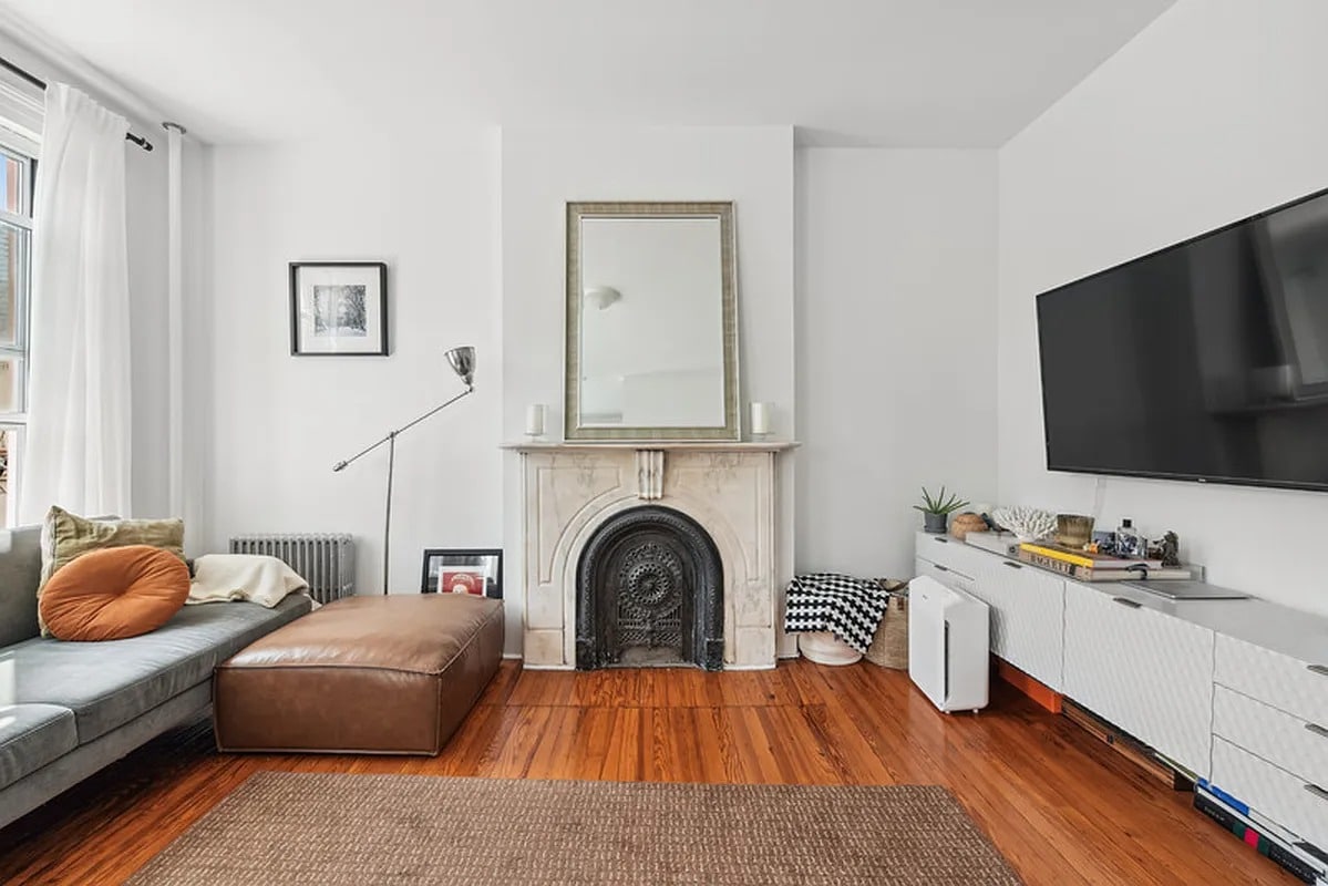 greenpoint - living room with marble mantel, wood floor