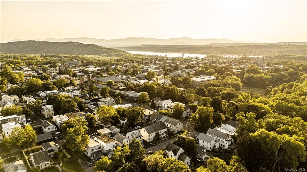 aerial view showing the neighborhood and the Hudson River in the distance