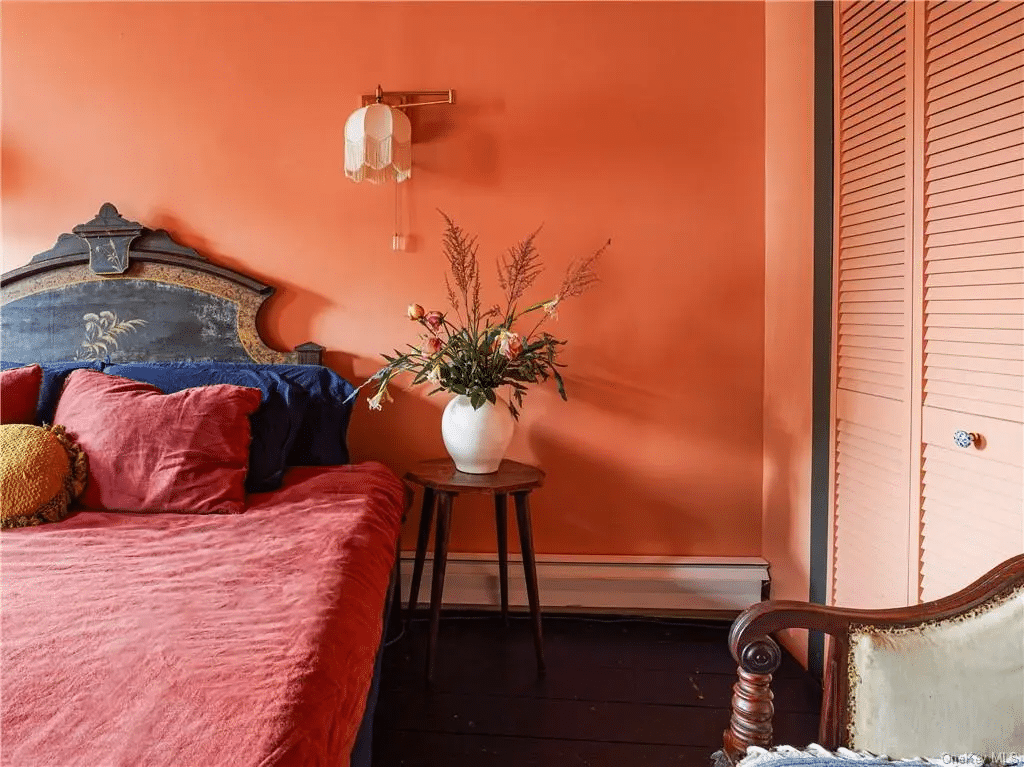 bedroom with orange walls