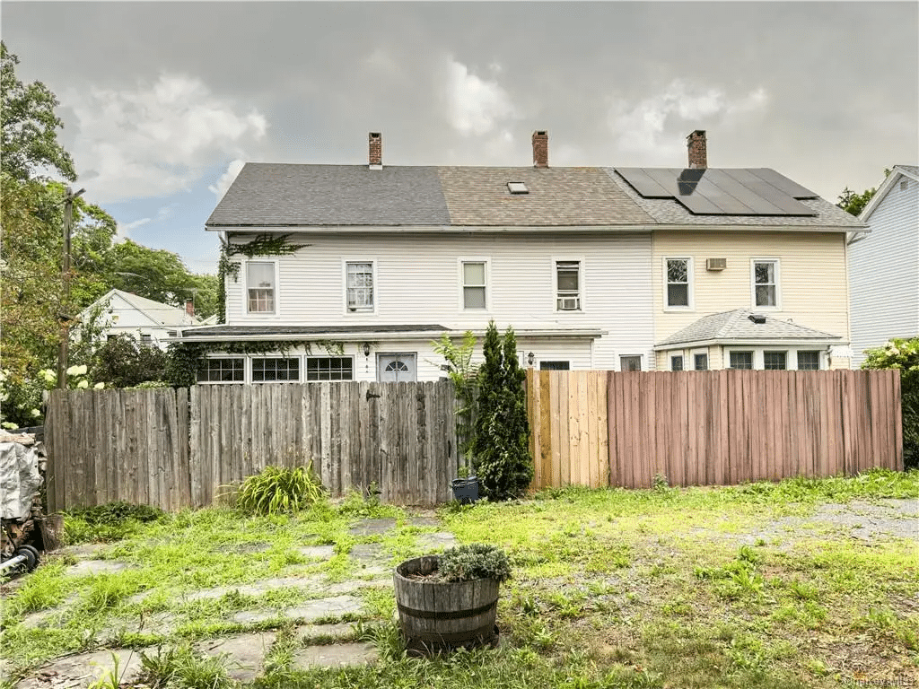 rear facade showing fence at rear yard