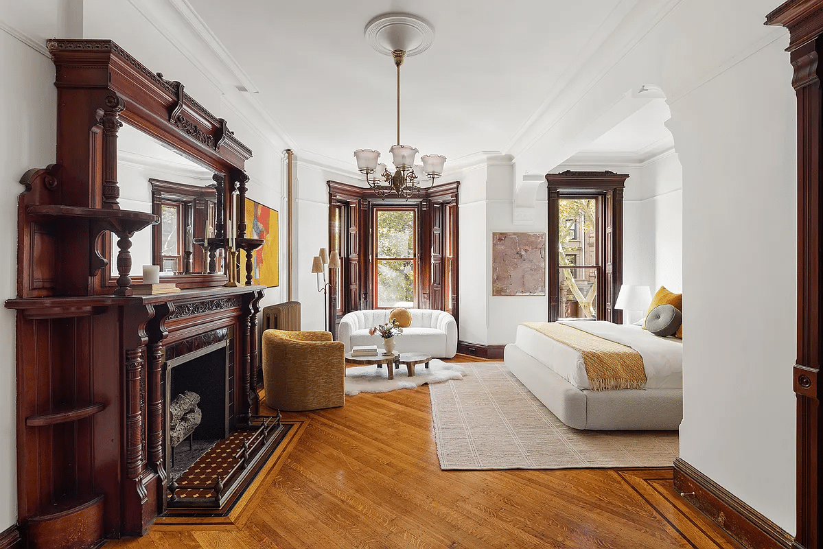 bedroom with a bed niche, mantel