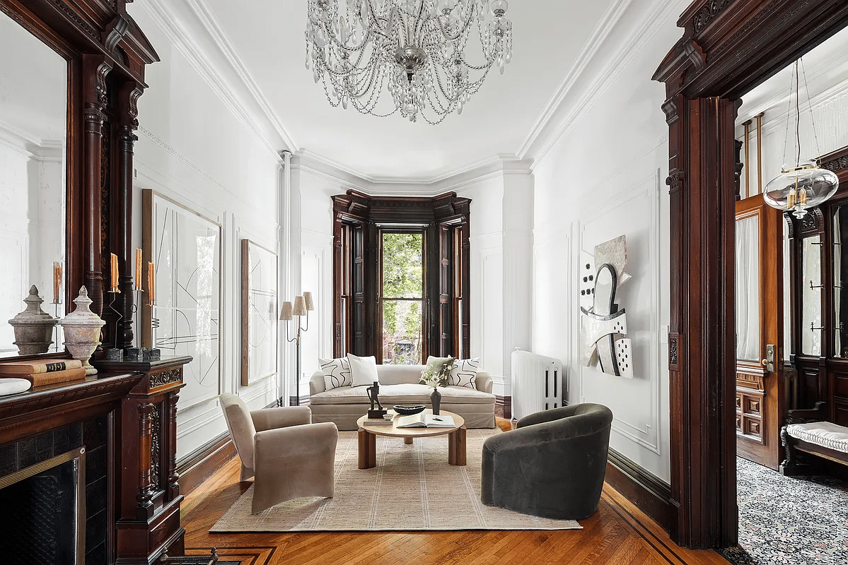 park slope - front parlor with mantel with mirror, wood floor, wall moldings