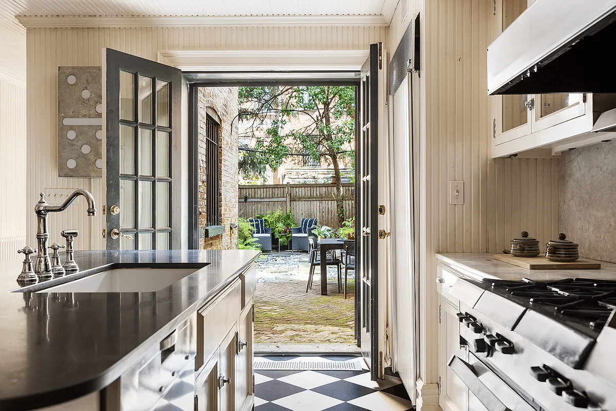 french doors in the kitchen lead to the garden