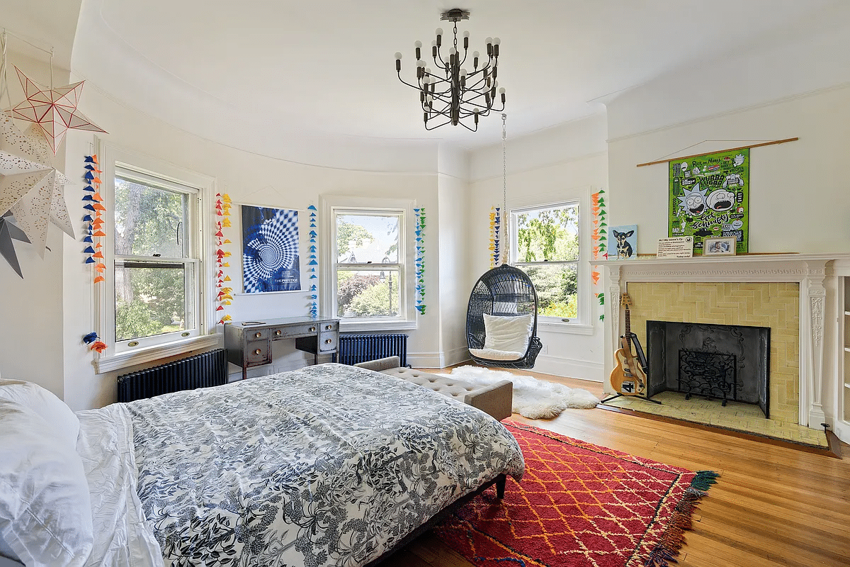 bedroom with mantel with yellow tile