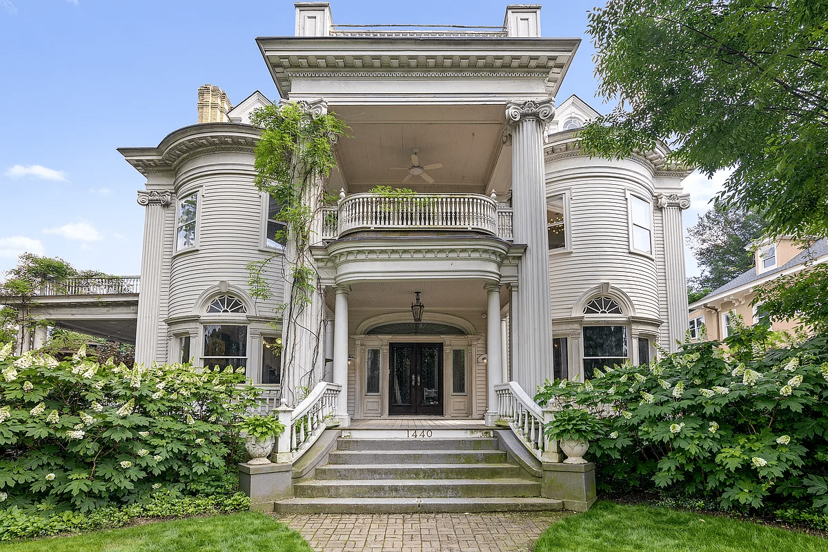 colonial revival exterior with elaborate portico