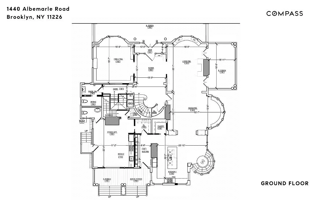 main level floorplan showing living room, dining and kitchen as well as a studio apartment