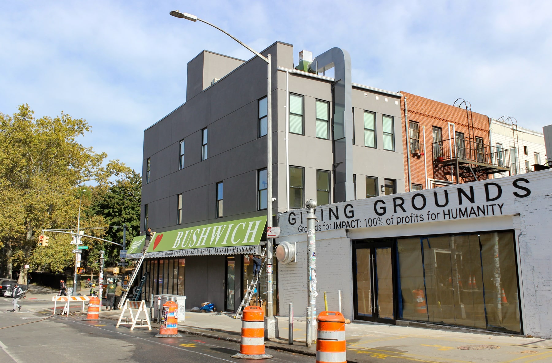 green awning on the side facade