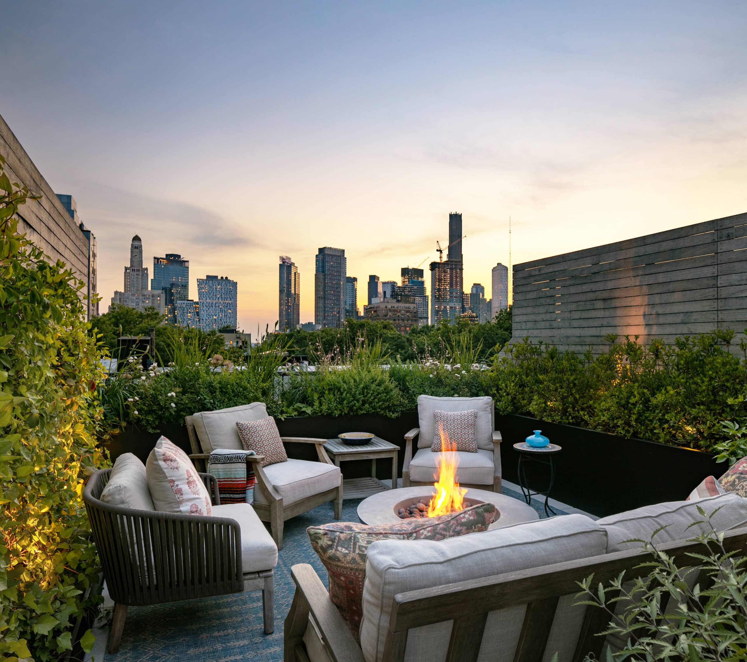 ROOFTOP TERRACE WITH FIREPIT AND SKYLINE VIEW