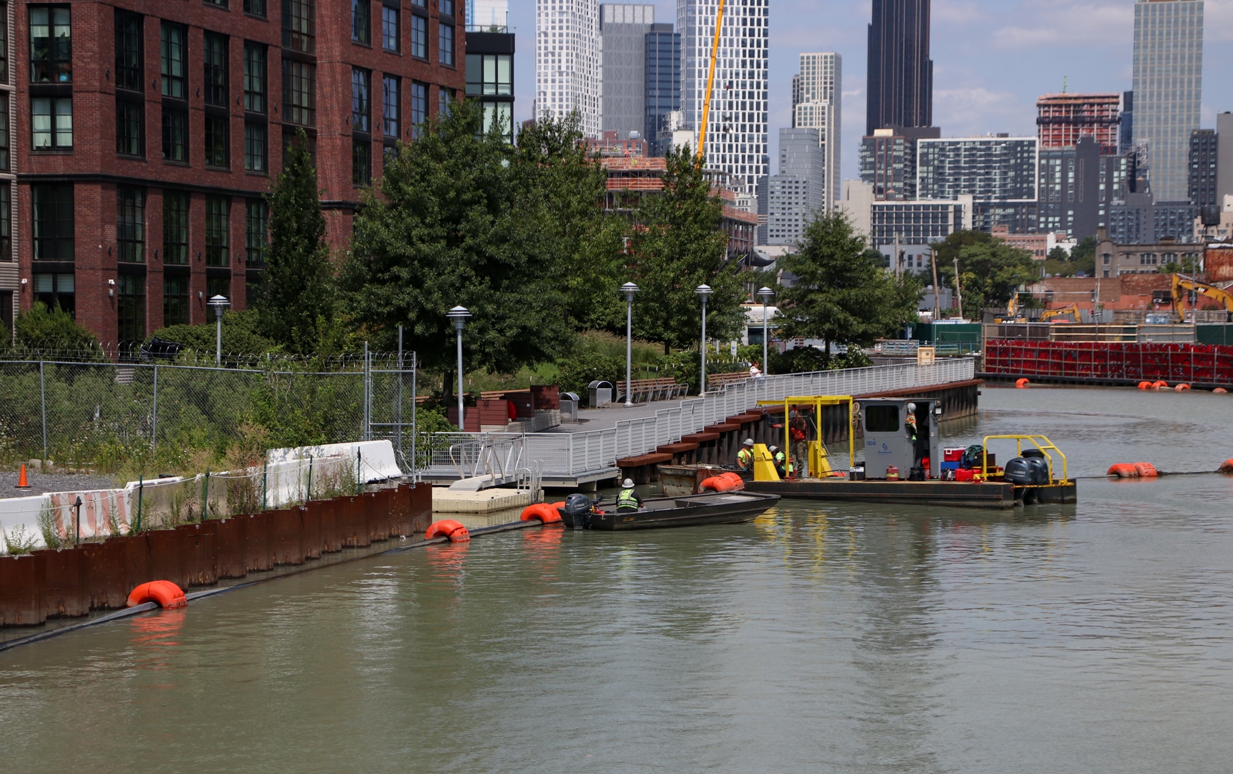 gowanus - cleanup workers on the canal in august of 2023