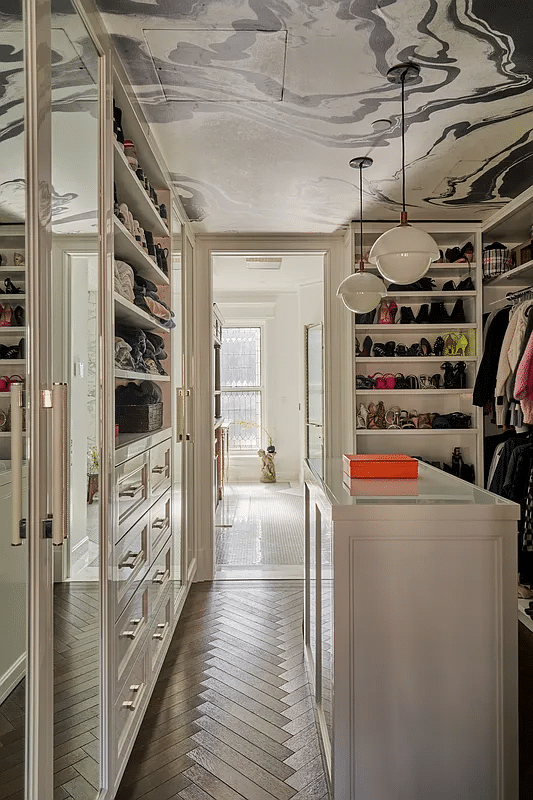 dressing room with white built-in storage