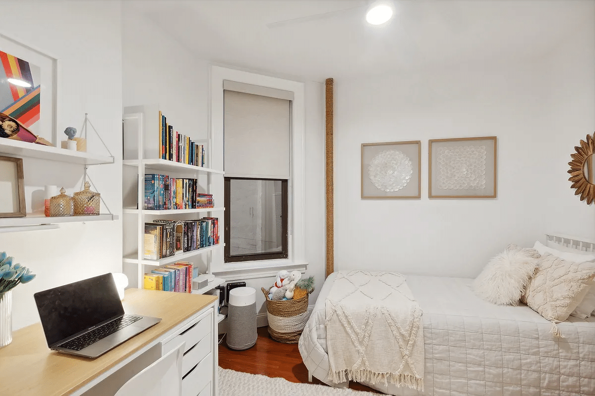 bedroom with one window, wood floor, room for a desk and twin bed