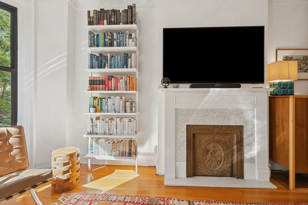 mantel with new tile surround and vintage insert