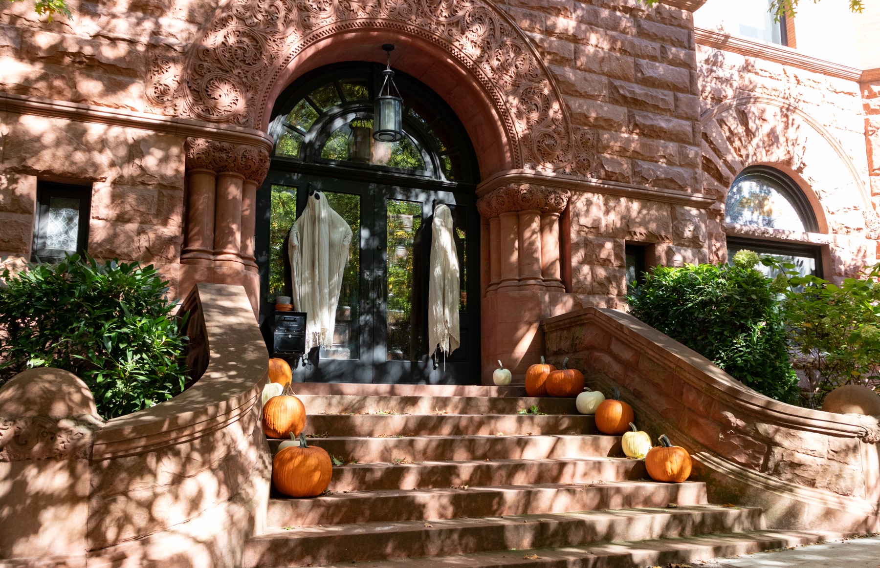 brooklyn - park slope stoop with pumpkins and ghosts for halloween