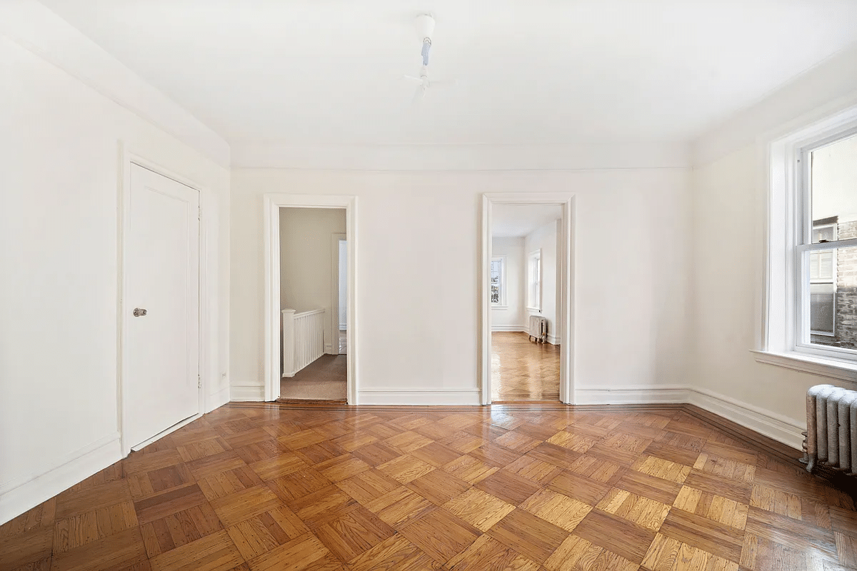 middle room with view to stair hall and a small bedroom