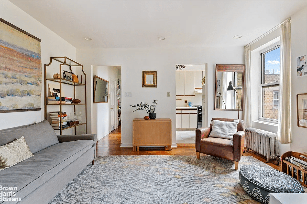 sunset park - living room with wood floor and view into kitchen