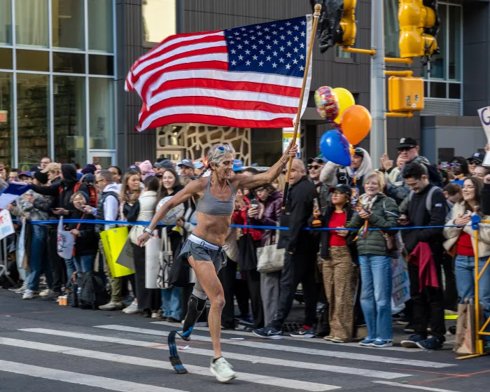 a runner with an american flag