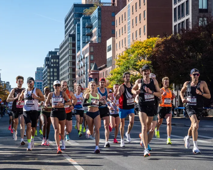 a tight pack of runners