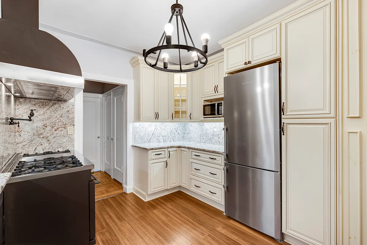 kitchen with cream cabinets and stainless steel appliances