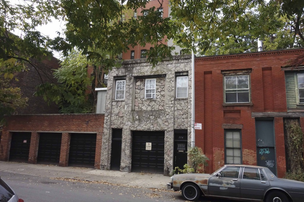 carriage house with a face stone veneer front