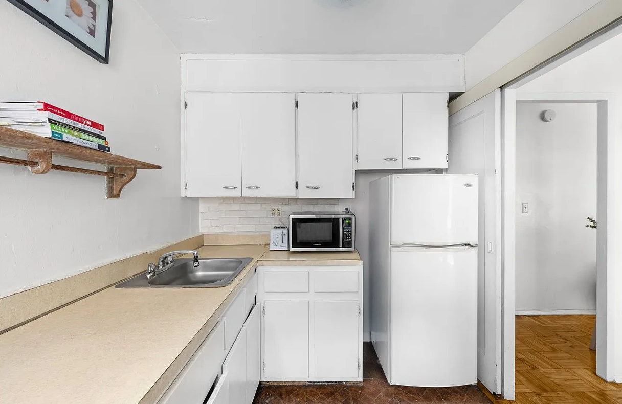 kitchen with white cabinets