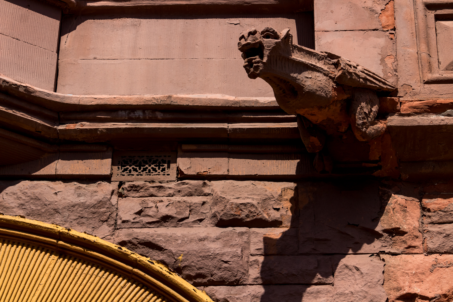 a brownstone gargoyle