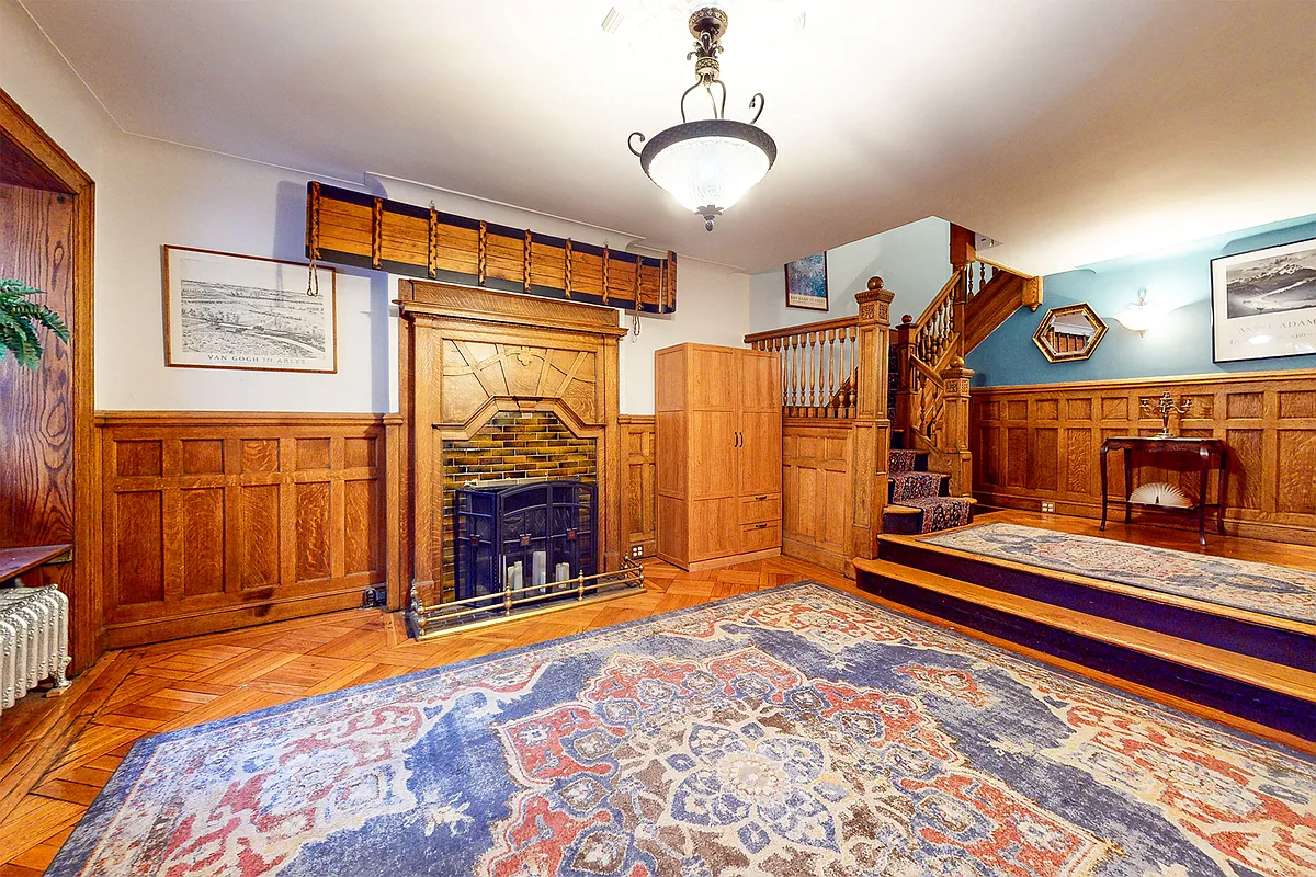 park slope - room with stair, wainscoting and a mantel