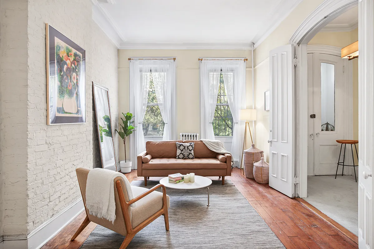 brooklyn open house - parlor with wood floor, white walls