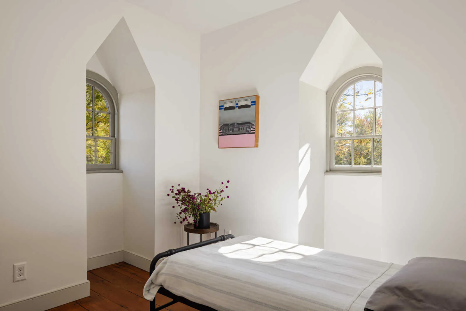 bedroom with two exposures in dormer windows