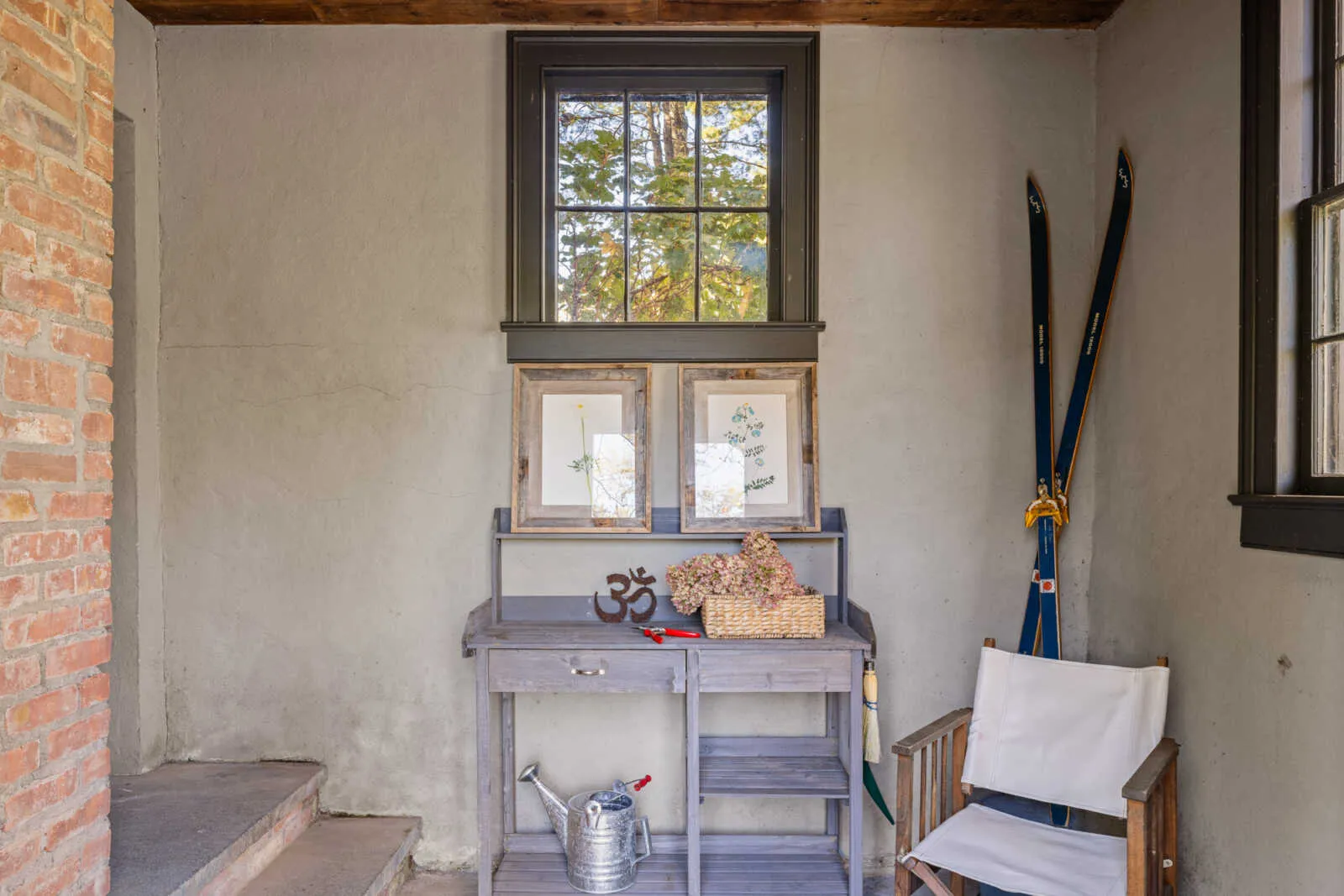 first floor room with exposed brick