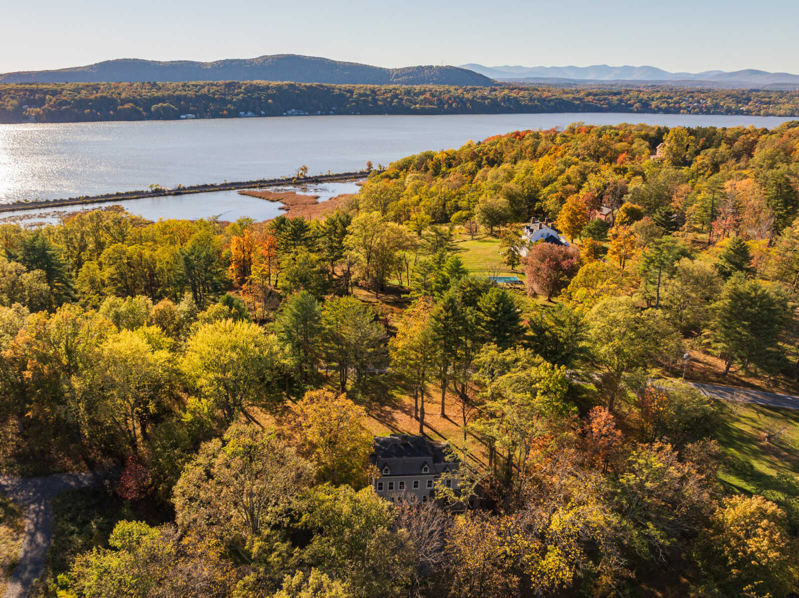 aerial view showing fall trees and view to Hudson River