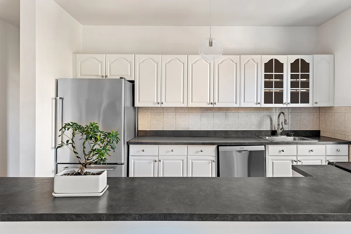 kitchen with white cabinets and stainless steel appliances