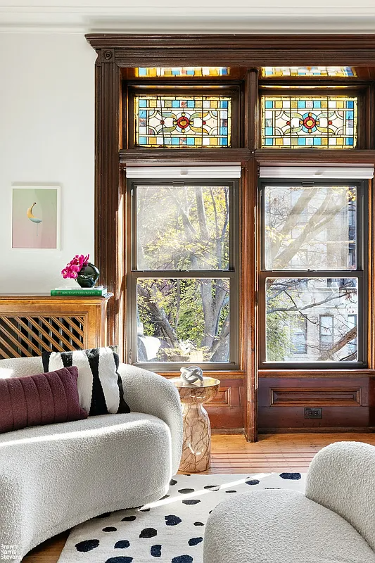 bedroom detail showing multi-colored stained glass