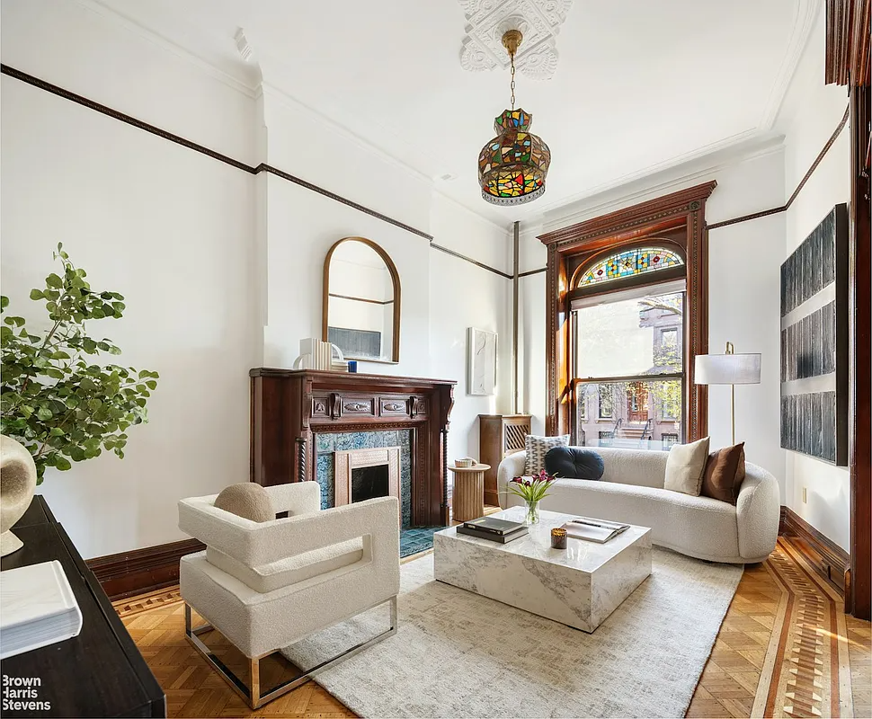 Bed Stuy - parlor with wood floor, mantel, stained glass