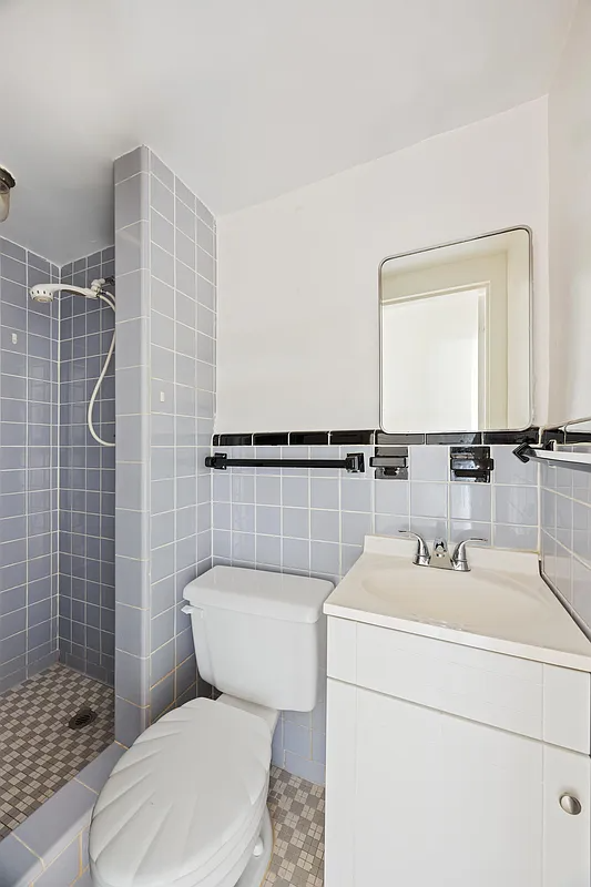 bathroom with blue wall tile