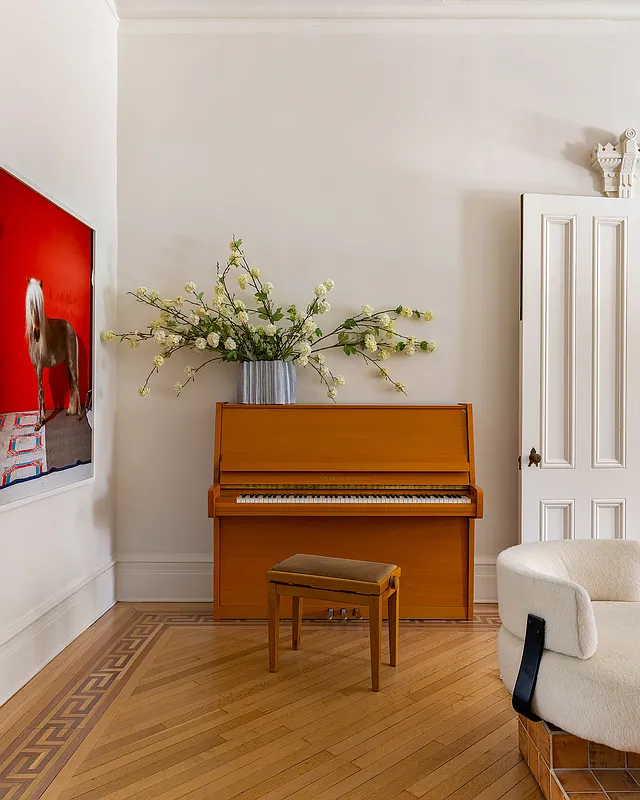 parlor with wood floor with inlaid border