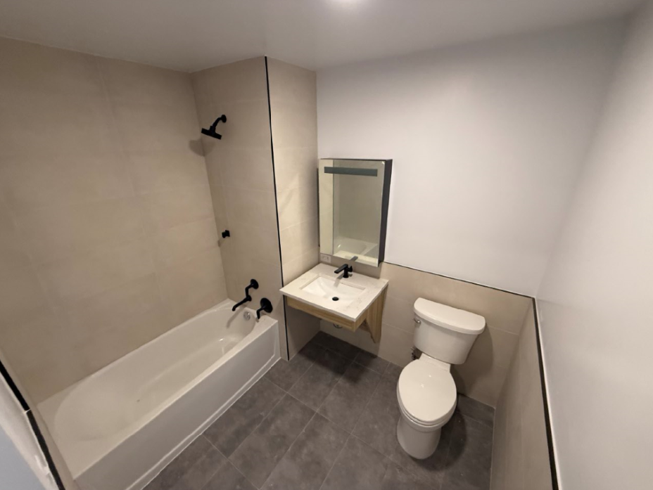 bathroom with beige tile