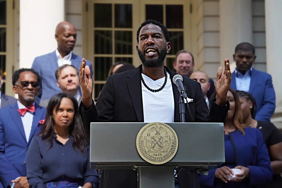 Public Advocate Jumaane Williams standing at a podium