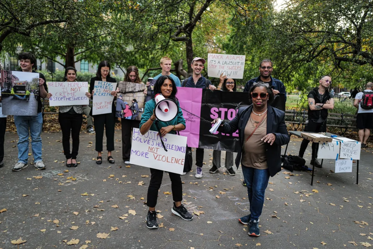 people with protest signs