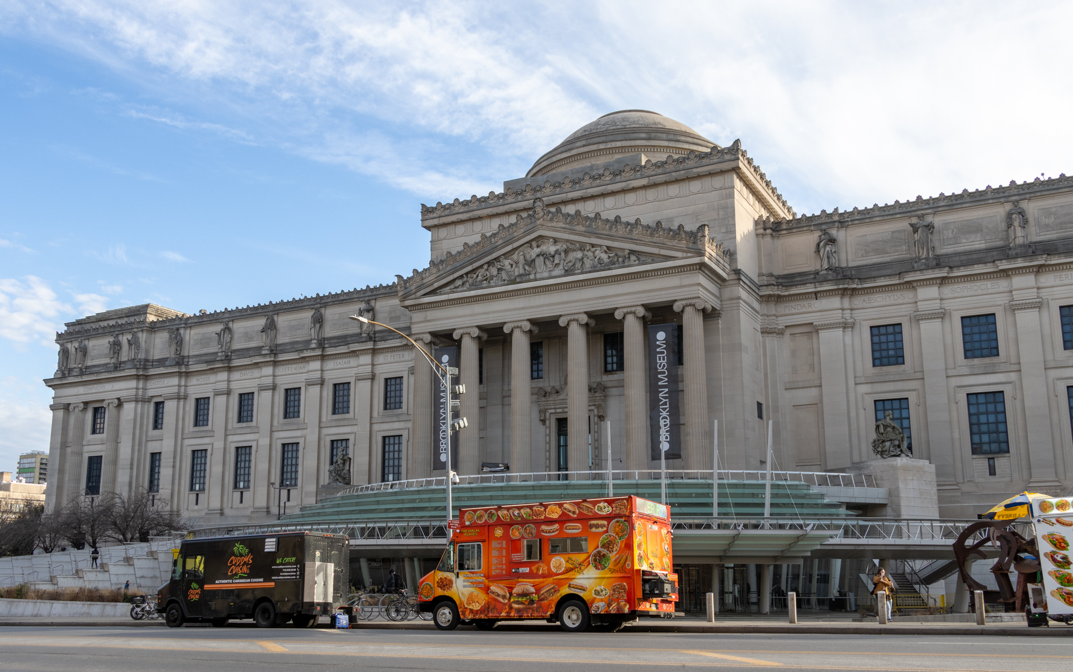 exterior view of the museum with food trucks out front