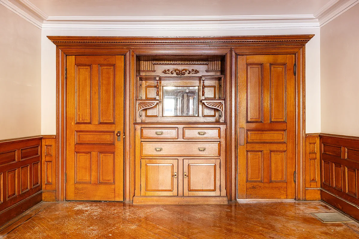 dinging room with built-in china cabinet